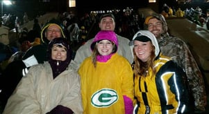 Brian Kubacki at a football game with other people