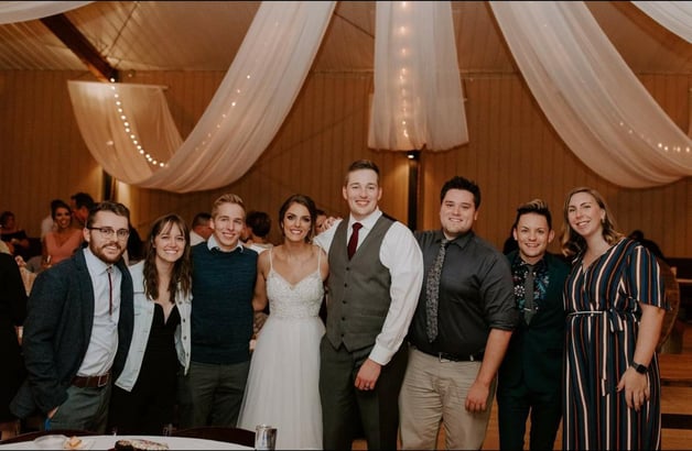Brian Kubacki at a wedding with other people