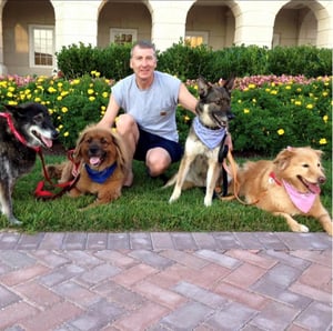 Dave Ofstein with his 4 dogs