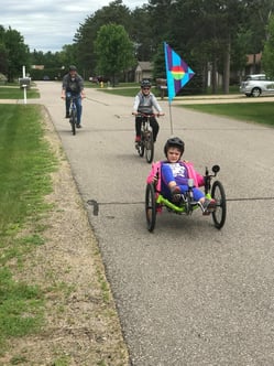 Hannah, Karl, and Paul returning from bike ride Spring 2020 (right